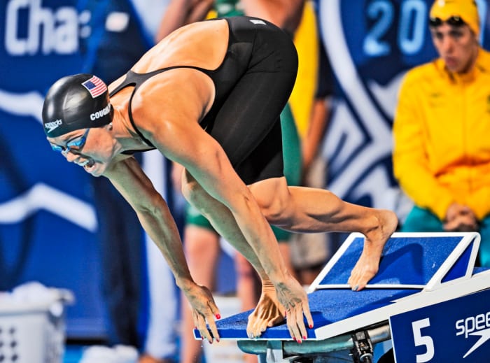 DIVING IN Coughlin, who won 12 medals at three Games, now uses her stroking power to punch down grapes.